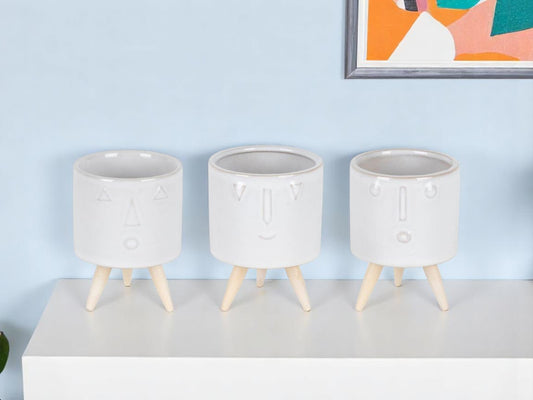 Set of Three White Porcelain 1 Ounce Round Funny Face Pot Planters With Stands-0