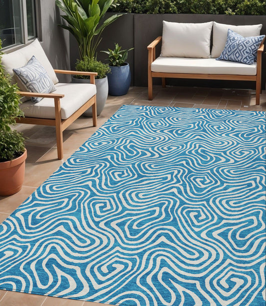5' X 8' Teal Blue And Ivory Abstract Washable Indoor Outdoor Area Rug-0